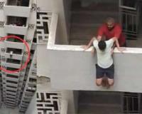 Caught on camera: Noida man tries to jump from high-rise building, saved by residents in nick of time