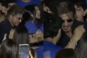 Shah Rukh Khan dances with kids, records AbRam's performance at Ambani school annual day